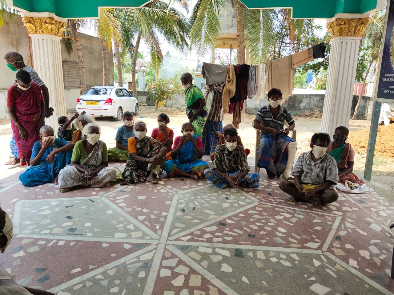 Community members gathered during a Hope Trust programme